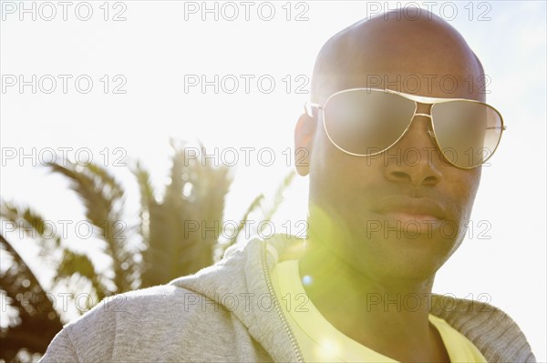 Man wearing sunglasses. Photographer: momentimages