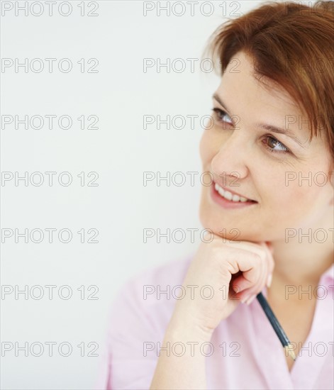 Woman thinking. Photographer: momentimages