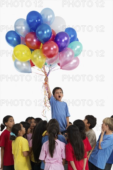 Children and balloons. Photographer: momentimages