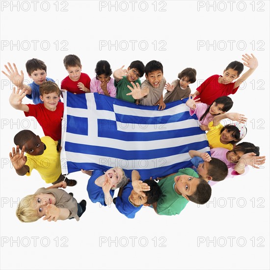 Children holding flag. Photographer: momentimages