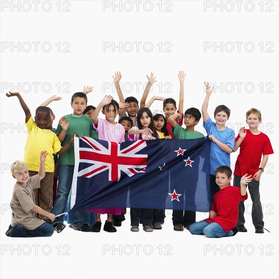 Children holding flag. Photographer: momentimages