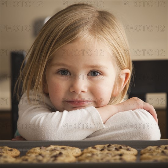 Girl waiting for cookies. Photographer: Mike Kemp