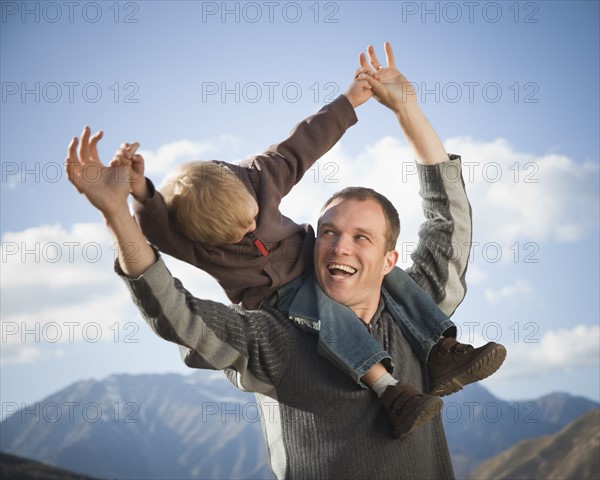 Father and son outdoors. Photographer: Mike Kemp