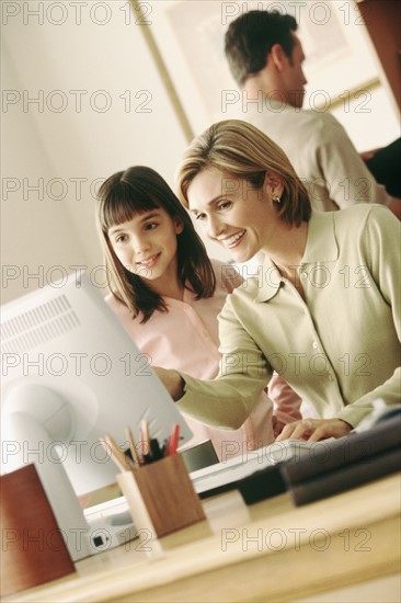 Family in home office. Photographer: Rob Lewine