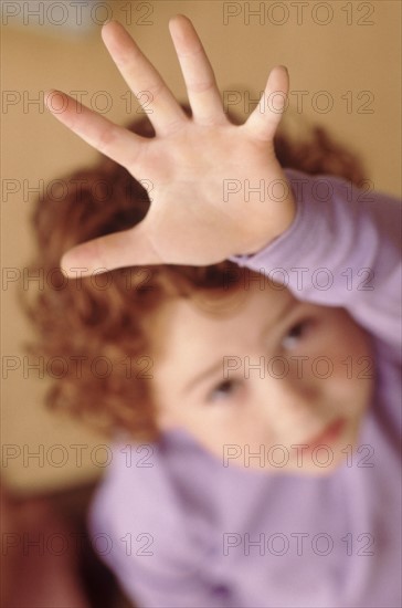 Student raising hand. Photographer: Rob Lewine