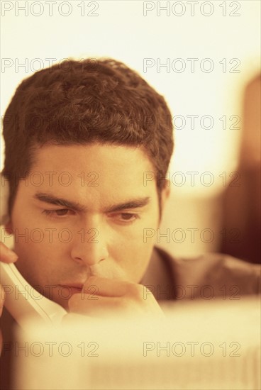 Man talking on the telephone. Photographer: Rob Lewine