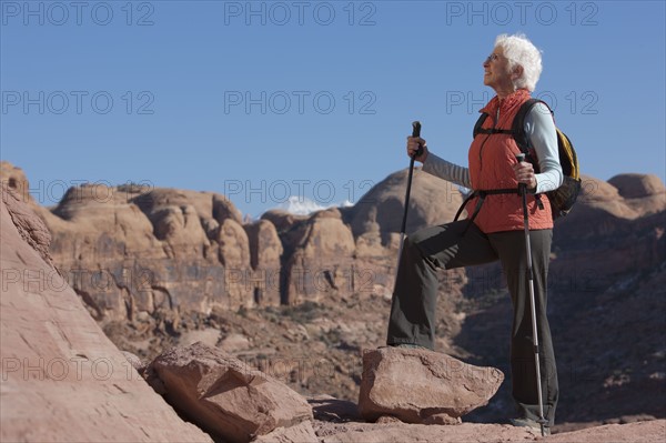 Elderly hiker in canyon. Photographer: Dan Bannister