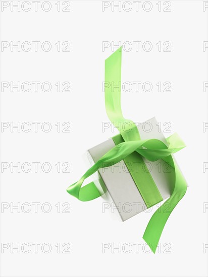 Gift and green ribbon. Photographer: David Arky