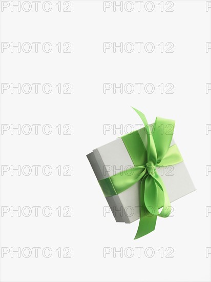 Gift and green ribbon. Photographer: David Arky