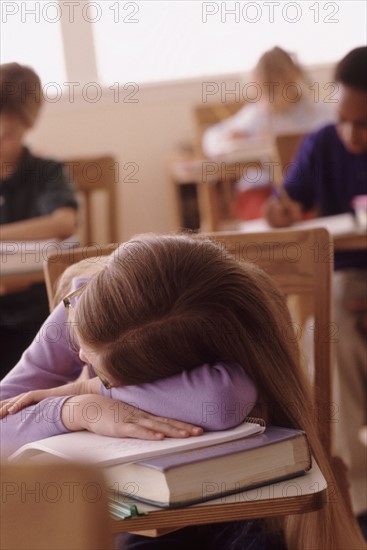 Student sleeping at desk. Photographer: Rob Lewine