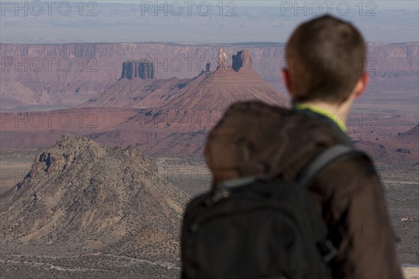 Hiker at top of canyon. Photographer: Dan Bannister