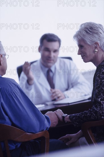 Couple in doctor's office. Photographer: Rob Lewine