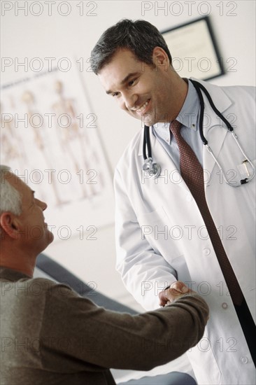 Doctor talking to patient. Photographer: Rob Lewine