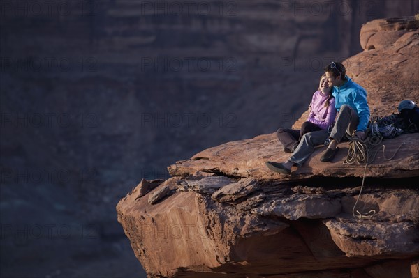 Hikers at top of cliff. Photographer: Dan Bannister