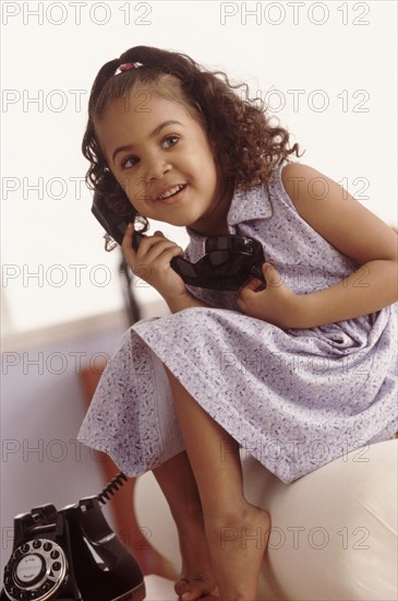 Girl talking on phone. Photographer: Rob Lewine