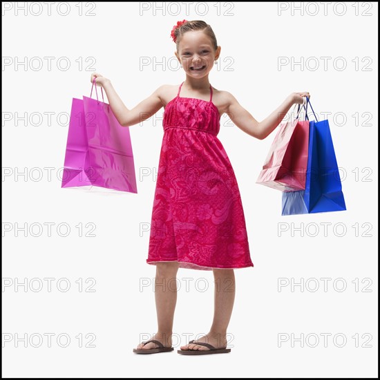 Girl with shopping bags. Photographer: Mike Kemp