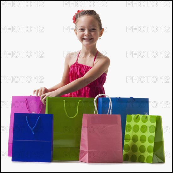 Girl with shopping bags. Photographer: Mike Kemp