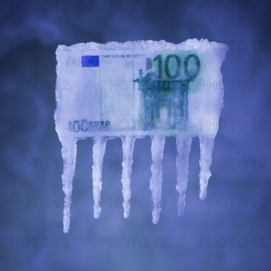 Money covered in ice. Photographer: Mike Kemp