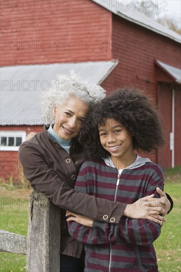 Woman embracing child. Photographer: Pauline St.Denis