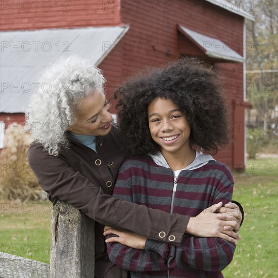 Woman embracing child. Photographer: Pauline St.Denis