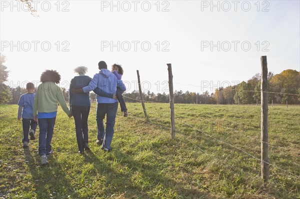 Family going for a walk. Photographer: Pauline St.Denis
