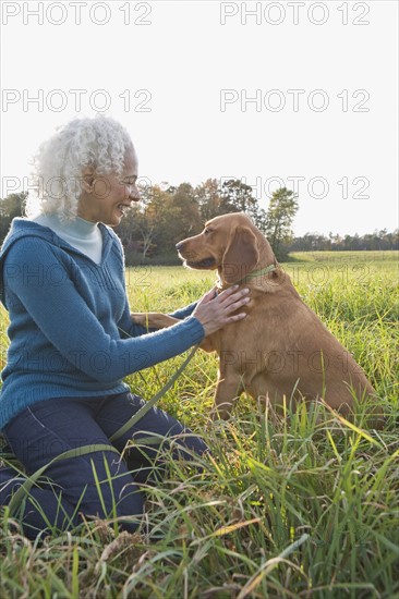 Woman and her dog. Photographer: Pauline St.Denis