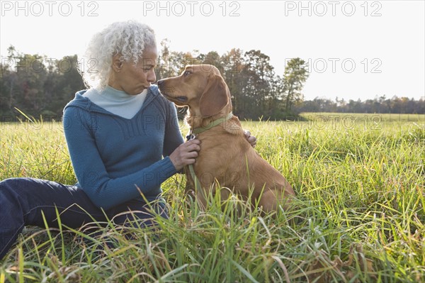 Woman and her dog. Photographer: Pauline St.Denis