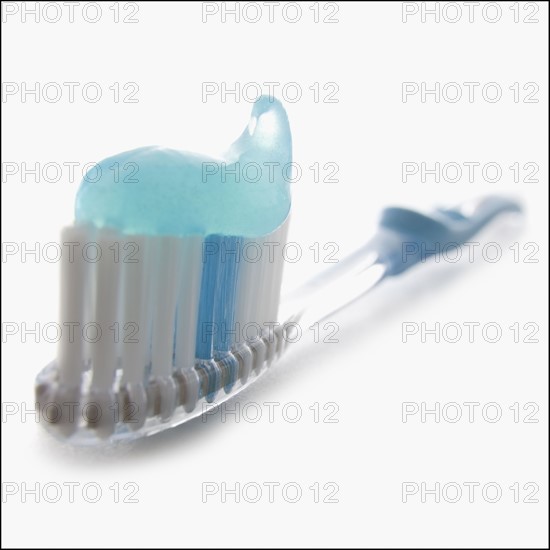 Toothbrush and toothpaste. Photographer: Mike Kemp