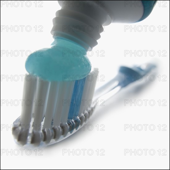 Toothbrush and toothpaste. Photographer: Mike Kemp