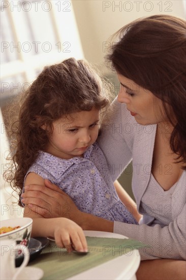 Mother talking to daughter. Photographer: Rob Lewine