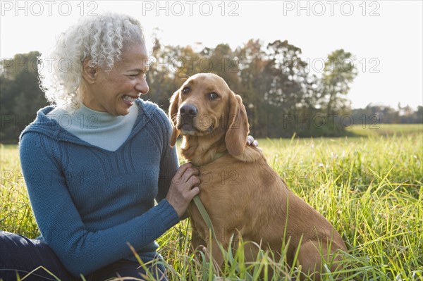 Woman and her dog. Photographer: Pauline St.Denis