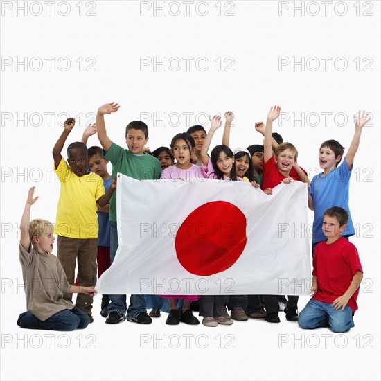 Children holding flag. Photographer: momentimages