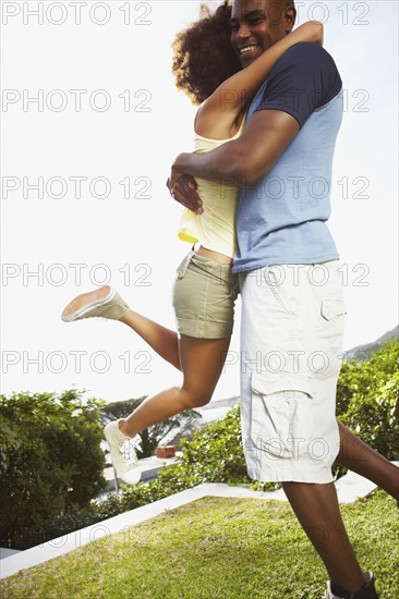 Couple embracing. Photographer: momentimages