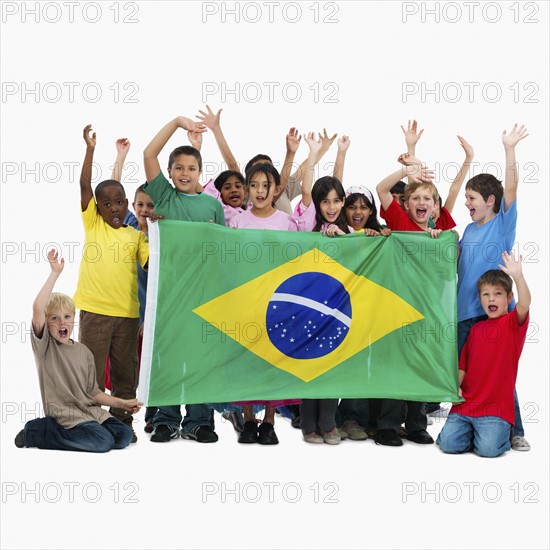 Children holding flag. Photographer: momentimages