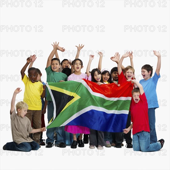 Children holding flag. Photographer: momentimages