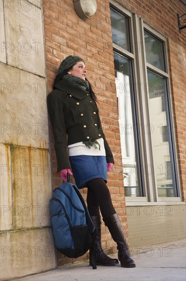 Woman waiting outside. Photographer: Daniel Grill