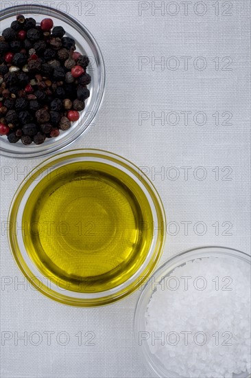 Peppercorns olive oil and sea salt. Photographer: David Engelhardt