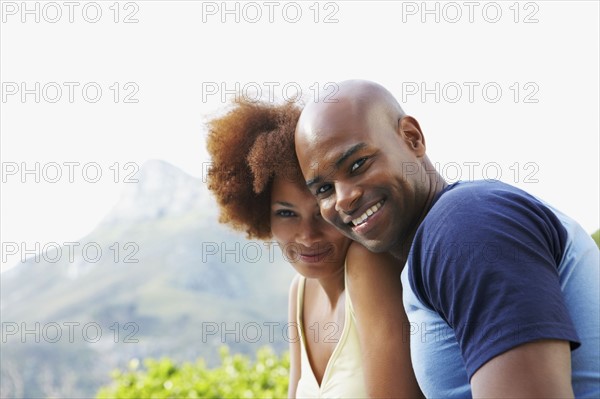 Couple relaxing outdoors. Photographer: momentimages