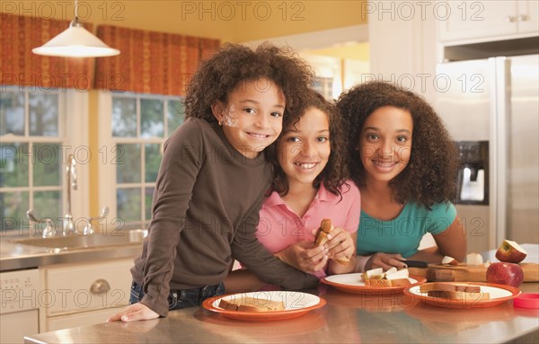 Eating peanut butter sandwiches. Photographer: mark edward atkinson