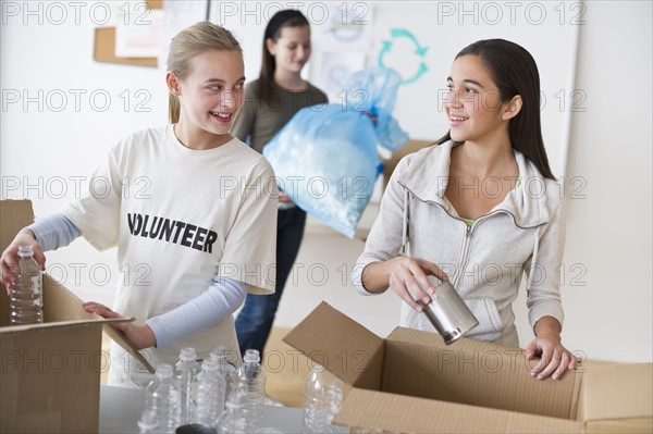 Volunteers recycling.