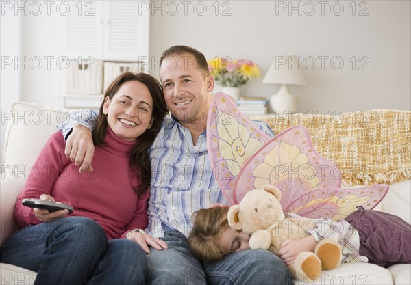 Family watching television. Photographer: Jamie Grill