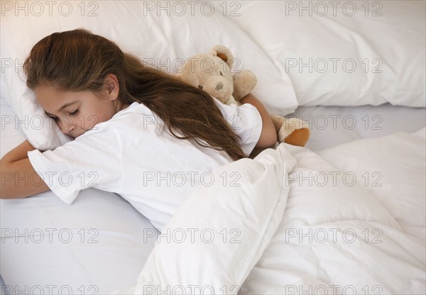 Young girl sleeping. Photographer: Jamie Grill