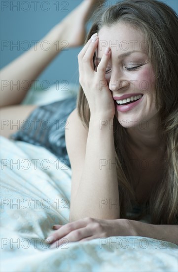 Woman laughing.