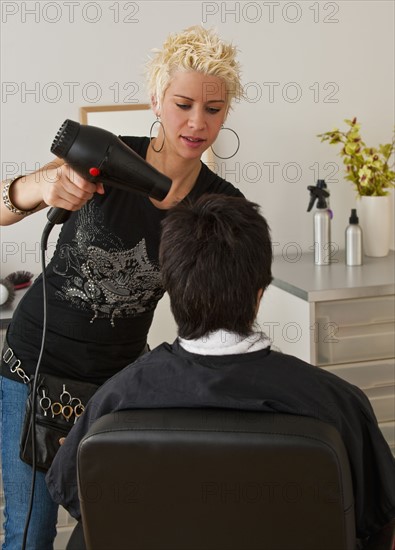 Hair stylist. Photographer: Daniel Grill