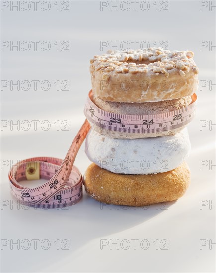 Donuts and measuring tape.