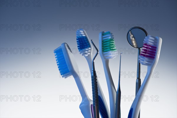 Toothbrushes and dental instruments.