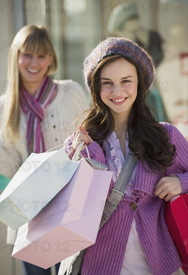 Young woman with shopping bags.