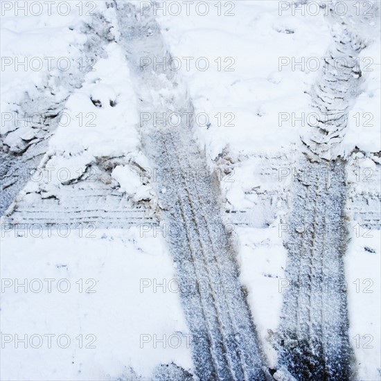 Tire tracks in snow.