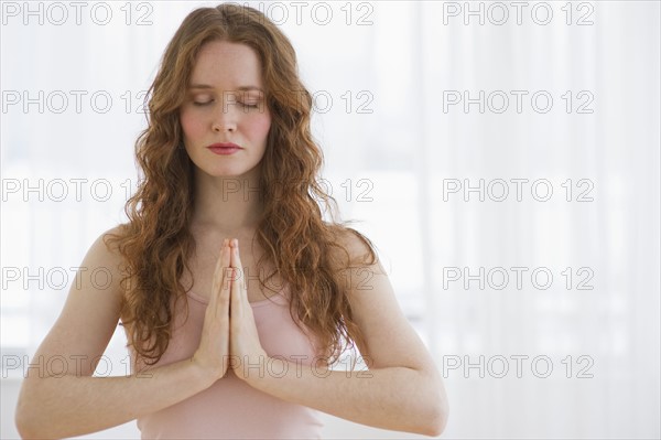 Woman meditating.