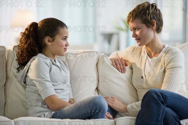 Mother and daughter having a serious talk.